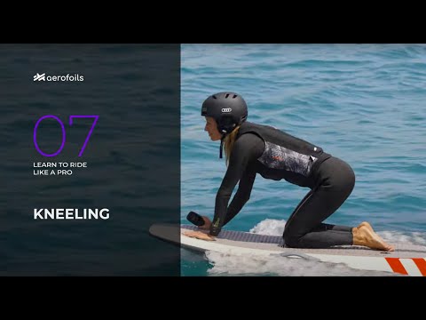 Aerofoils Academy 07 kneeling on the efoil board