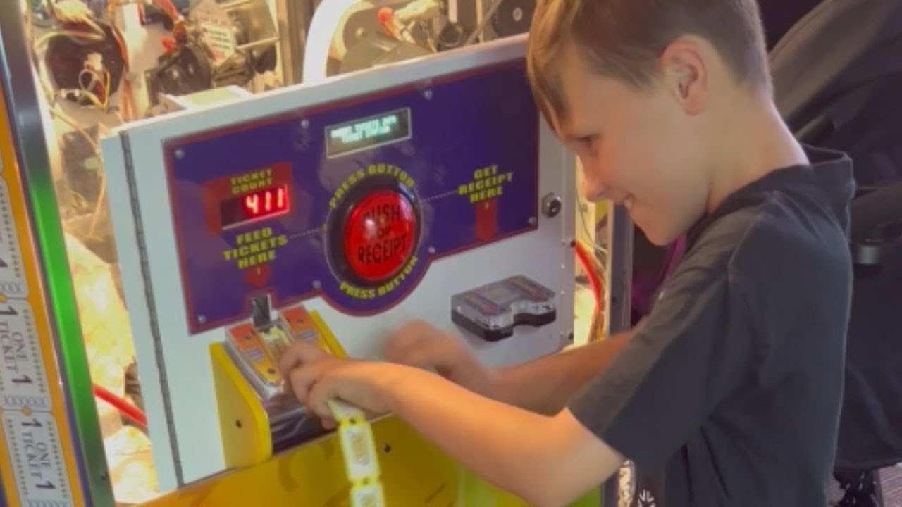 Boy wins big in the arcade by feeding the ticket machine over 2,000 tickets || WooGlobe