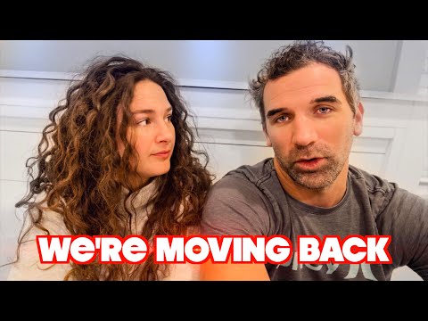 A man and a woman sit side by side, the woman gazing at him, with bold red text reading “WE'RE MOVING BACK” across the bottom.