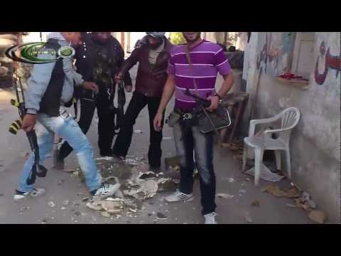 تحطيم رموز النظام داخل الكتيبة 666 في منطقة السيدة زينب في دمشق بعد السيطرة عليها من قبل لواء شهداء الجولان