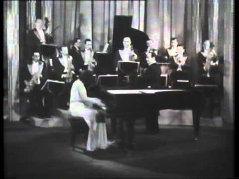 Patricia Rosborough, piano & orch. "classical" music partly in dance tempo. footage 1933.
