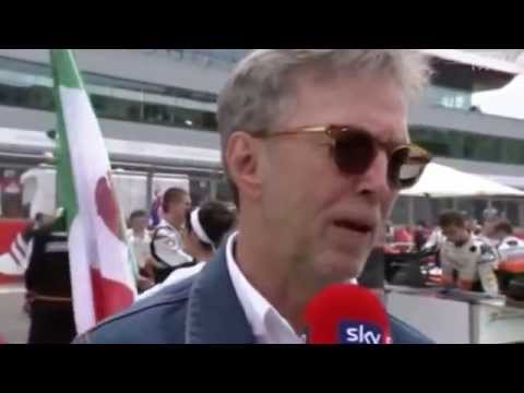 Eric Clapton with his wife Melia - Grid Walk with Martin Brundle F1 2014 British GP - Pre - Race