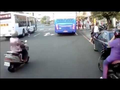 woman almost hit by bus