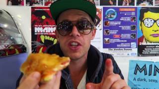 Eating deep-fried Pizza and a deep fried Mars bar in Edinburgh, Scotland