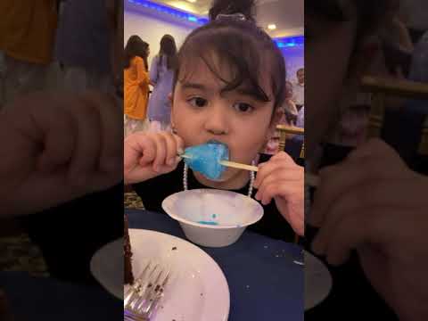 Maymunah eating snowball/gola#short