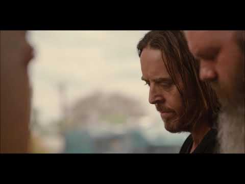 Upright, piano scene. Starring Tim Minchin and Milly Alcock.