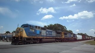 preview picture of video 'CSX Long Mixed Freight Train Through The Middle Of Folkston GA'