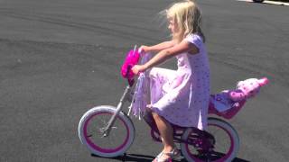 Maggie getting good riding on her bike! Sept 2015
