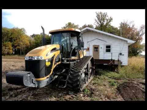 Cat Challenger MT765C Tractor moving a house
