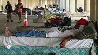 Homeless Under Freeway Told to Leave