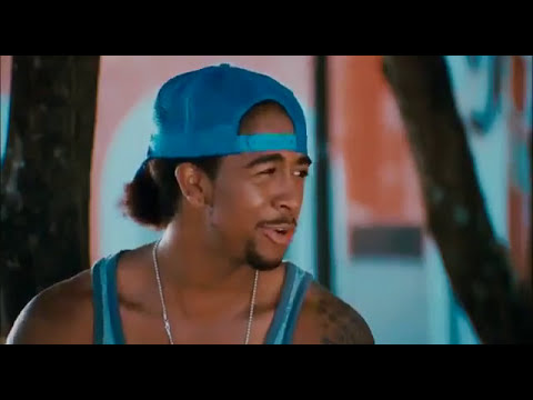 Trailer frame: outdoor stage resembling parade/performance climax underscored by reggaet\u00f3n
