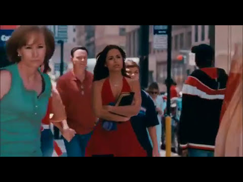 Trailer frame: packed dance floor suggesting diegetic reggaetón placement