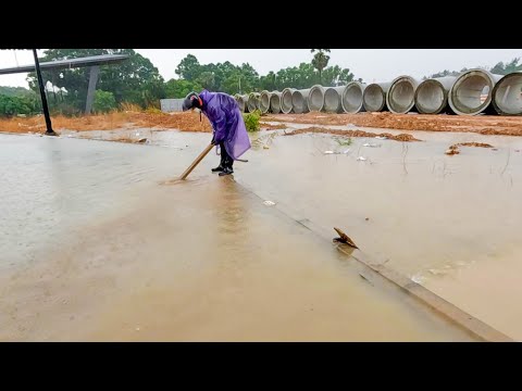 Draining A Massive Flooded Street After The Rain