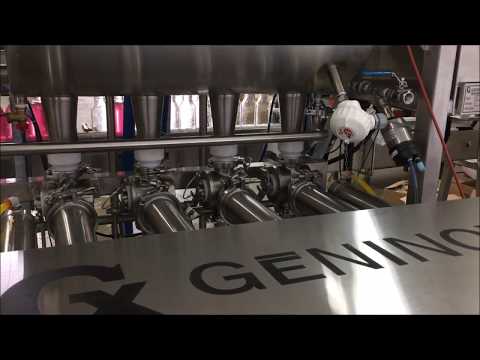 G24 - Embouteilleuse à 4 têtes avec système de remplissage automatique et coupe-goutte_2