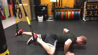 TRX Spider-Man push-ups