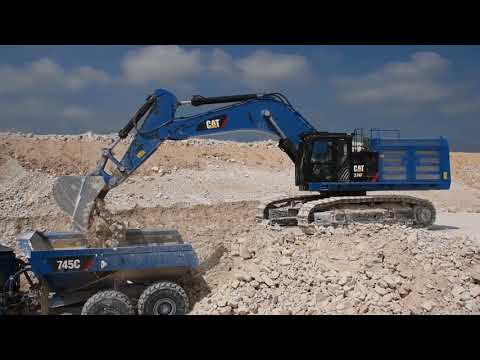 Caterpillar 374F loading 745C