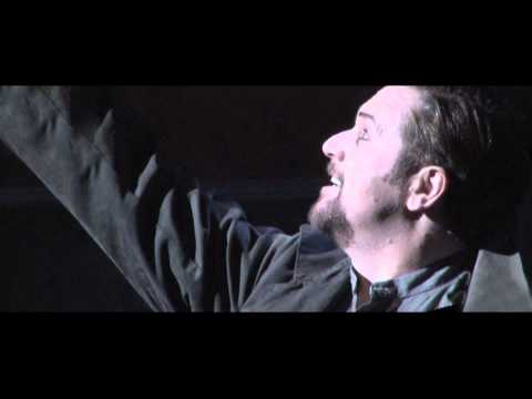 Sweeney Todd musical trailer frame — stark chair and razor silhouette on black