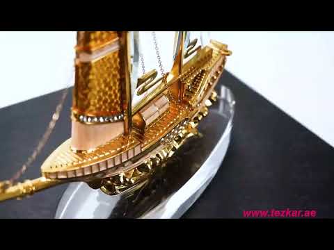 Golden Boat-Shaped Memento in Metal with Glass Base | Tezkar Gift Dubai