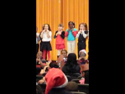 Baby G singing with the Kinder crew