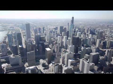 A wide-angle helicopter flight around downtown Chicago