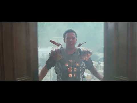 Dogma 1999 official trailer frame with Bethany and Metatron in a night street scene