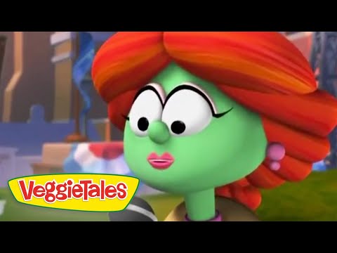 Close-up of a green-skinned VeggieTales character with red hair and pink lips, logo visible in the bottom-left corner.