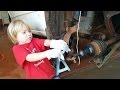 Kindergarten mechanic replaces wheel bearing on ...