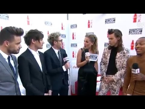 Louis and Harry checking each other out