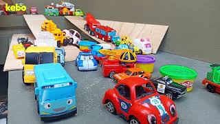 Find toy racing cars, cement mixer trucks, trains, steel tanks, planes, excavators, backhoes, tel...