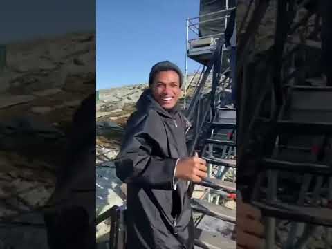 Watch the cast react to Tom Cruise riding a motorbike off a cliff.
