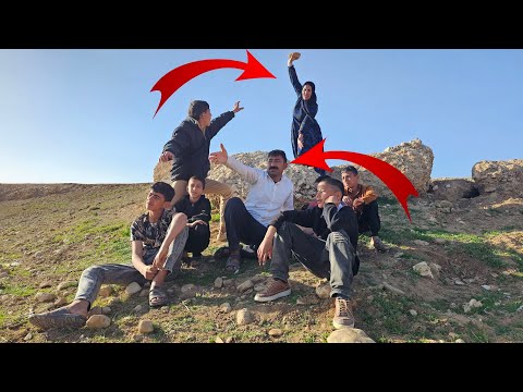 Gathering the village children and Babak talking to them 