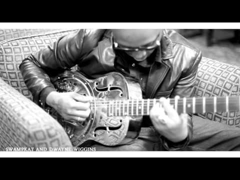 swampkat and dwayne wiggins at thier studio playing some dope guitar.
