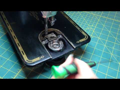 Removing the bobbin case from a Singer 201 Video
