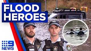 NSW Police brave rising floodwaters to save trapped man | 9 News Australia