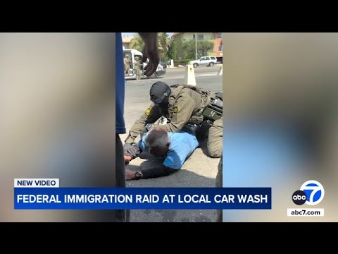 Border patrol takes man into custody at car wash
