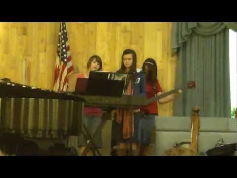 Whitley girls singing Wrap me in Your Arms at church