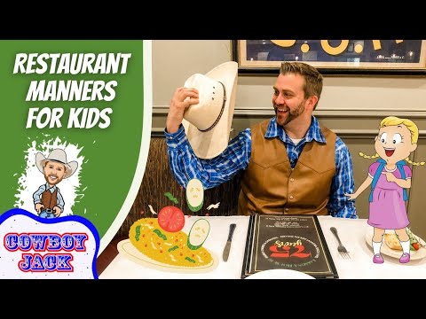 Man in a brown vest and blue plaid shirt lifts his hat and smiles at a cartoon girl with a backpack at a restaurant table; left side shows a green banner reading 'Restaurant Manners for Kids' with 'Cowboy Jack' logo; plate of food and a menu are on the table.
