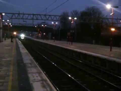 DRS 68007 + 68004 working 4S43 Daventry to Mossend 'Tesco Express' pass Stafford 10/2/15