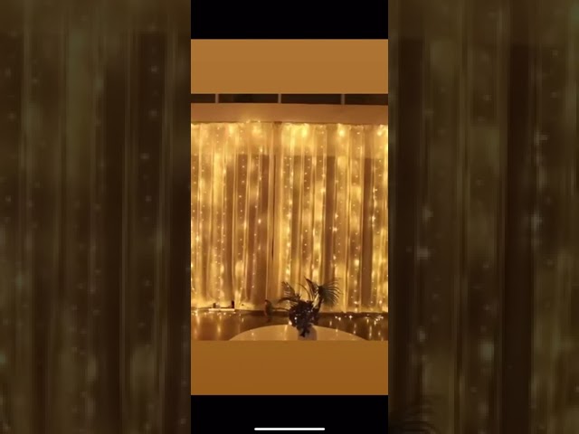 Vídeo relacionado con IXTRIMA - Cortina luminosa (200 LED, 5 m, luz azul, cable blanco, IP65, extensible, efecto flash, con cables suspendidos a longitudes alternas (30-70-40-60 cm) para efecto cascada