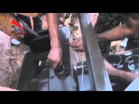 تجهيز مدفع الهاون من قبل عناصر كتيبة مهاجري الشام لضرب مدفعية الزهراء في محافظة حلب