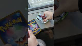 Opening a pokemon pack in front of a plane at the airport #pokemonchannel #pokemoncards #airport