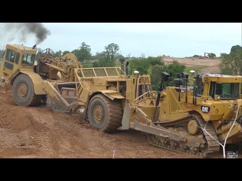 Caterpillar D8T Dozer Push Loading Caterpillar 627F Scraper