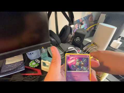 (Asmr) opening packs of Pokémon cards