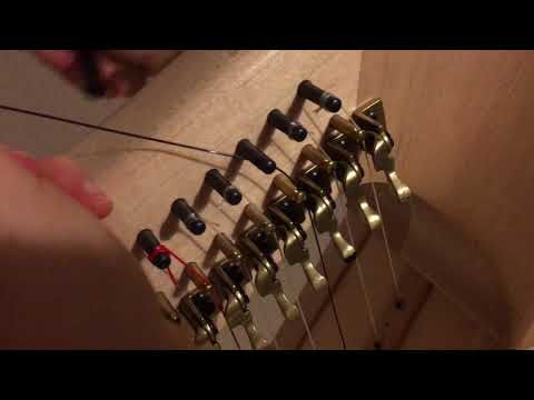 How to replace a harp string