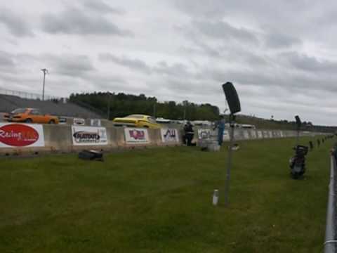 yellow 70 duster small block wheelstand