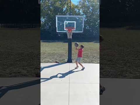 4'8 kid dunking on 7 feet! (First dunk on 7 ft)