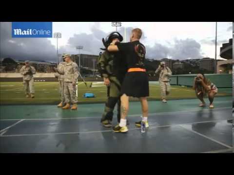 Woman runs record mile in 'Hurt Locker' bomb disposal suit