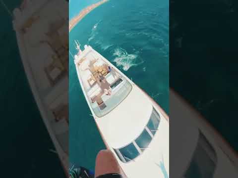 Kite Surfing over a 126 feet Yacht