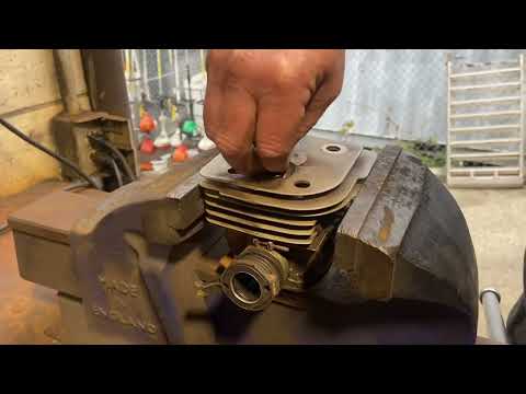 Donny walkers chainsaws installing spark plug insert
