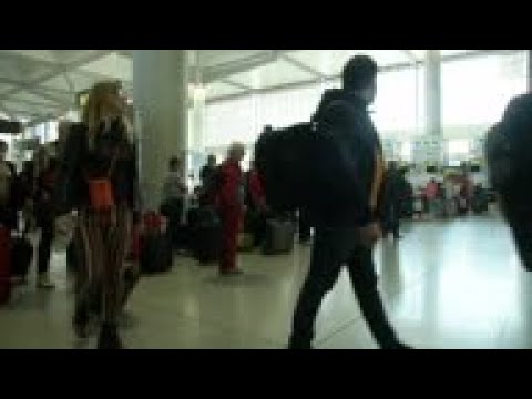 Foreign tourists leave Spain as emergency declared